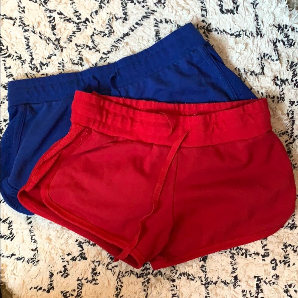 2 shorts blue and red. Size medium kids